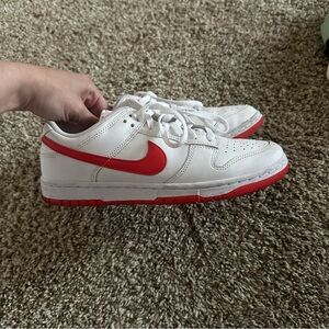 Nike White Low-Top Sneakers with Red Swoosh